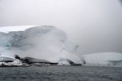 05C Glaciers Covering Land Next To Foyn Harbour On Quark Expeditions Antarctica Cruise.jpg